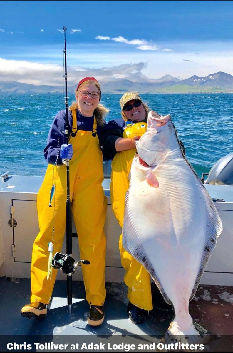 Two anglers with trophy Adak Halibut