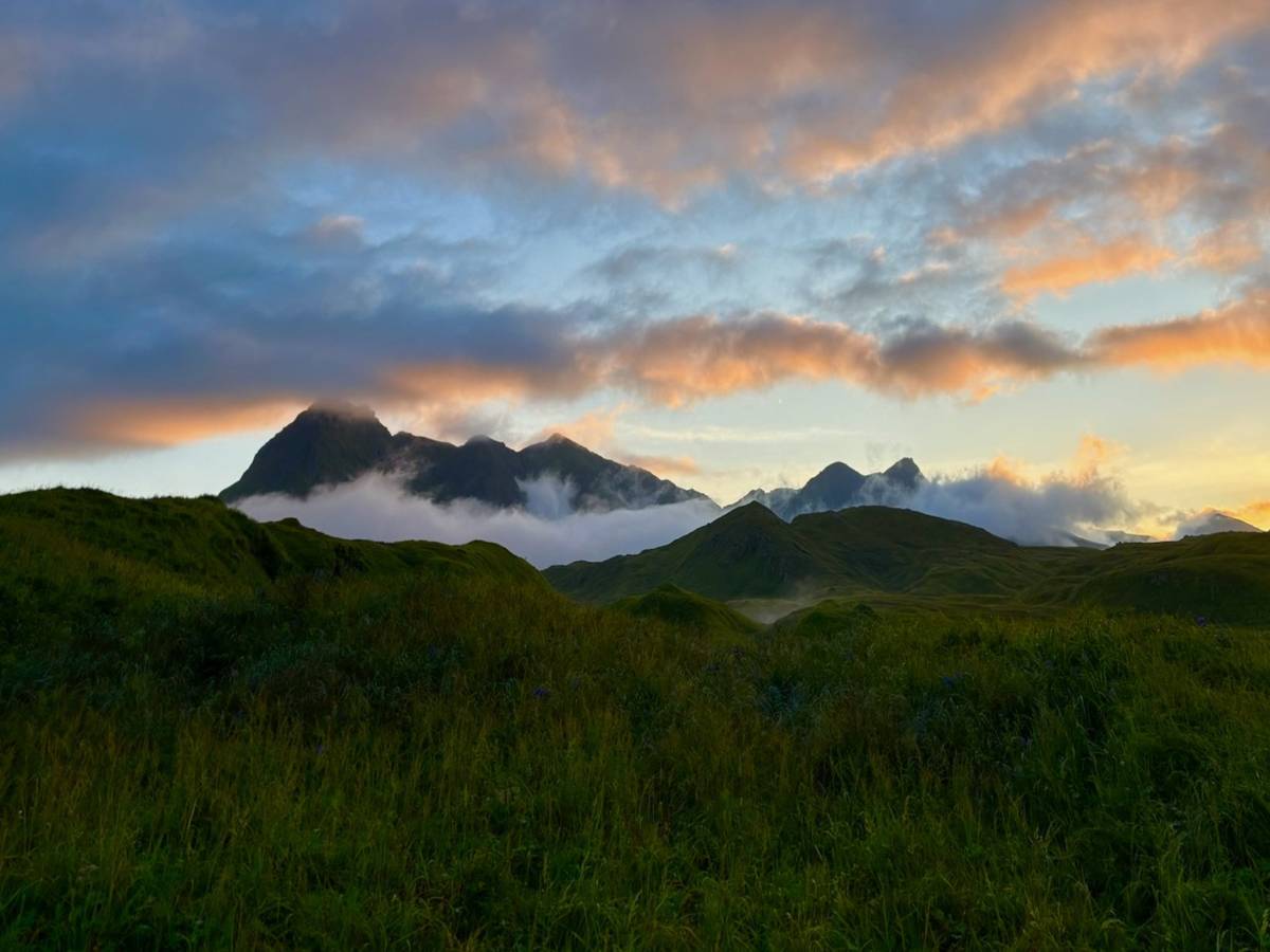 Sunset over the Adak mountain ridge