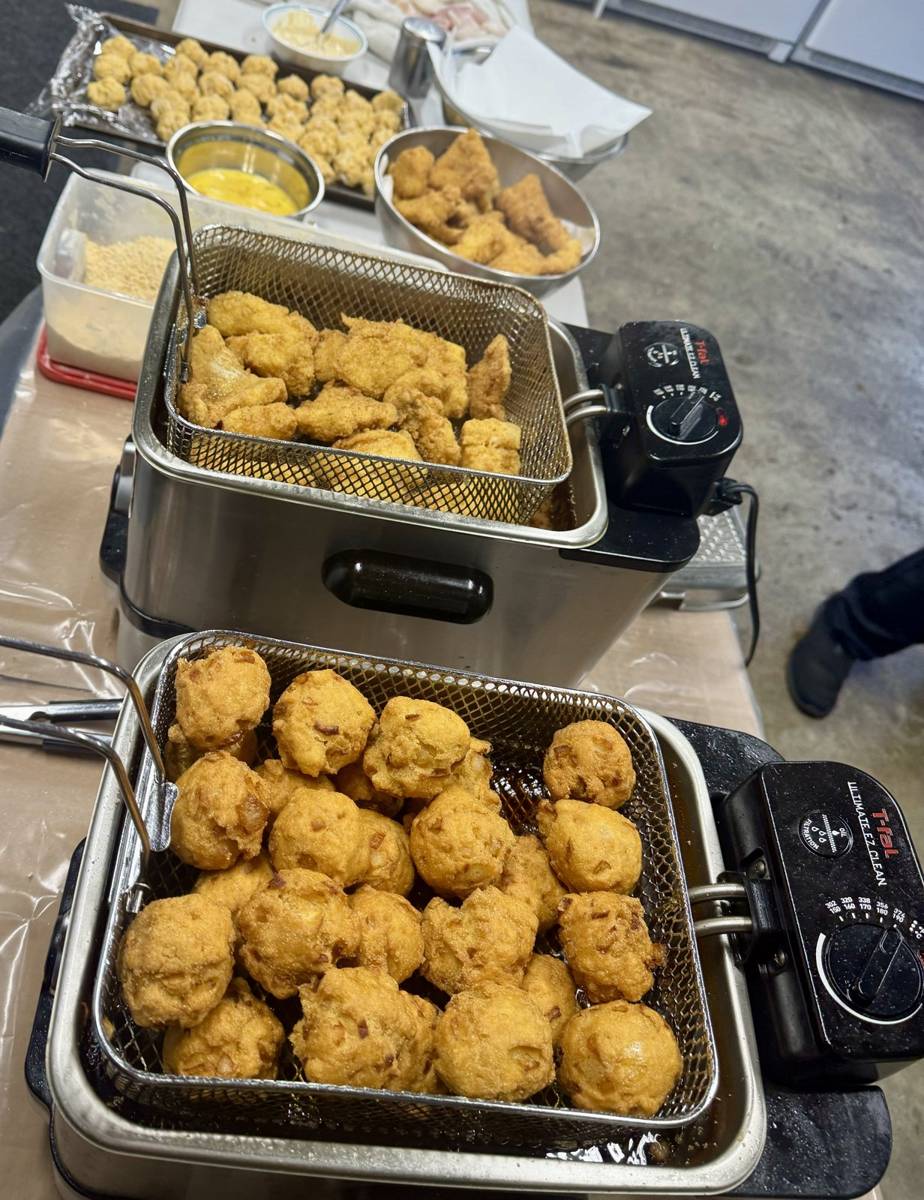 Fresh hush puppies and fried fish from the deep fryer